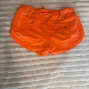 Neon orange lululemon shorts